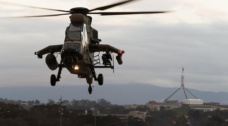An Australian Army Tiger armed reconnaissance helicopter lands at Russell Offices during Army Demonstration Day 2018 in Canberra. Phot by Sergeant Ray Vance.