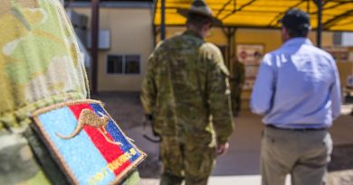 Commander Task Group Taji-7, Australian Army Colonel Michael Say briefs Minister for Defence Personnel Darren Chester at the Taji Military Complex in Iraq. Photo by US Army Specialist Audrey Ward.