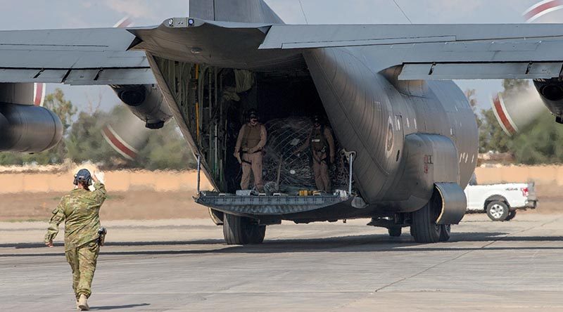 A Royal New Zealand Air Force C-130 Hercules delivers supplies for coalition troops based at Iraq’s Camp Taji. Photo by Corporal Anita Gill.