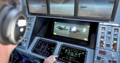 A Royal Australian Air Force air refuelling officer on the flight deck of a KC-30A Multi Role Tanker Transport controls refuelling operations for a Dassault Rafale M from the French during an Operation Okra mission over the Middle East. Photo by Corporal David Cotton.