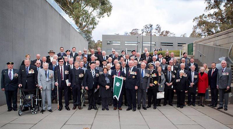 Members of Helicopter Flight Vietnam at the Australian War Memorial, Canberra, after the presentation of Unit Citation for Gallantry with guests including Governor General Sir Peter Cosgrove, Minister for Veterans' Affairs Darren Chester and former CN Vice Admiral Tim Barrett. RAN photo.