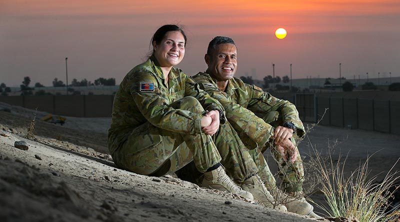 Australian Army soldiers Private Nikita Rounds and her father Sergeant Joseph Rounds catch up in the Middle East while concurrently deployed on operations in the region. Photo by Petty Officer Andrew Dakin.