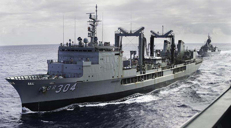 HMAS Success in company with HMAS Toowoomba (rear), and HMAS Adelaide (handrail, front) during Indo Pacific Endeavour 2018. (This image was digitally altered by Defence (no details)). Photo by Able Seaman Kieran Dempsey.