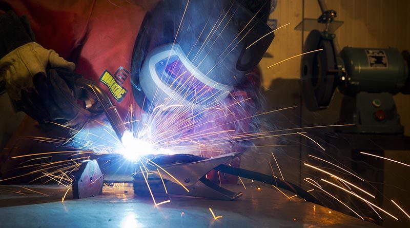 Royal Australian Air Force ground mechanic engineer Leading Aircraftman Luke Coghlan, from Combat Support Unit, welding in the Mechanical and Electrical Operations Maintenance Section (MEOMS) workshop at Australia’s main logistics base in the Middle East Region. Photo by Corporal Oliver Carter.