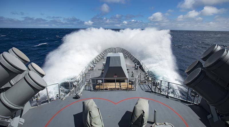 HMAS Ballarat steams toward Amsterdam Island in the Indian Ocean during an international search-and-rescue of two solo yachtsmen on separate distressed yachts. Photo by Able Seaman Christopher Szumlanski.