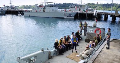 Manus Island Regional Processing Centre (MIRPC) staff board an Australian landing craft Lombrum Naval Base, Manus Island. Photo by Sergeant W Guthrie.