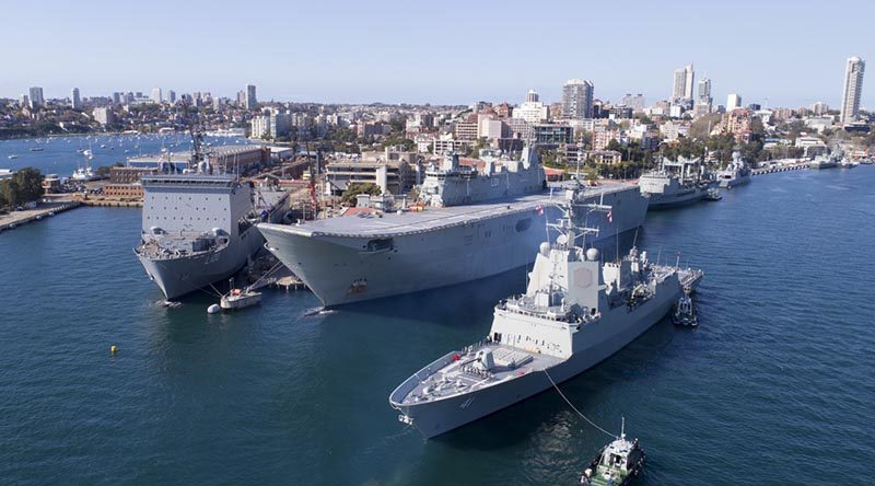 NUSHIP Brisbane arrives at Fleet Base East for the first time, joining (left to right) HMA Ships Choules, Adelaide, Success, Warramunga and ex-HMAS Darwin. Photo by Warrant Officer Shane Cameron.