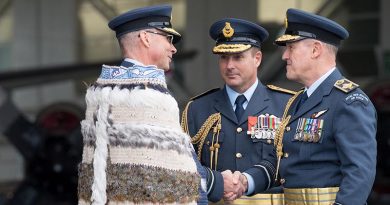 Chief of Defence Force Air Marshal Kevin Short, right, shakes hands with new Chief of Air Force Air Vice-Marshal Andrew Clark, with outgoing Chief of Air Force Air Vice-Marshal Tony Davies centre, at the change of command ceremony in Auckland today. NZDF photo.