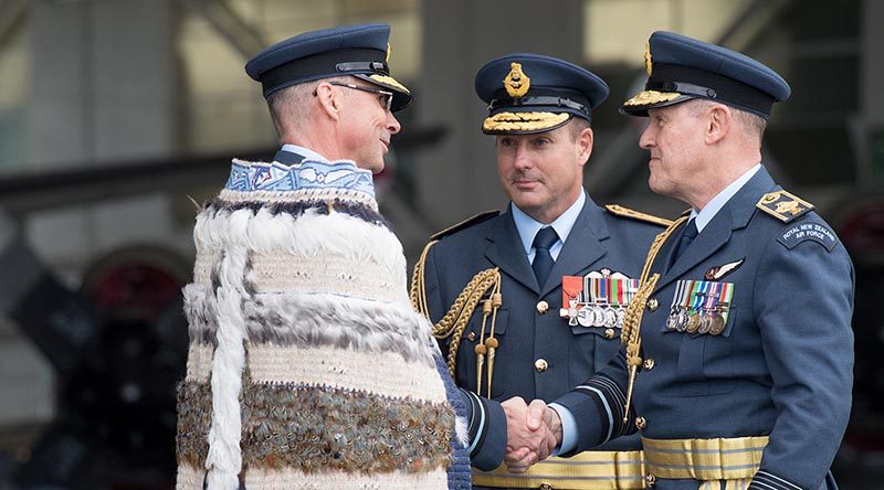 Chief of Defence Force Air Marshal Kevin Short, right, shakes hands with new Chief of Air Force Air Vice-Marshal Andrew Clark, with outgoing Chief of Air Force Air Vice-Marshal Tony Davies centre, at the change of command ceremony in Auckland today. NZDF photo.
