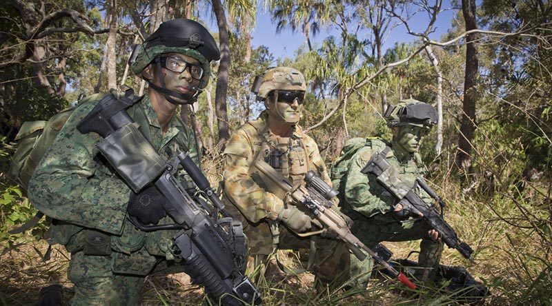 Australian soldier Lance Corporal Chris Gagliardi, 7RAR on exercise with Singapore Army soldiers in Shoalwater Bay Training Area. Photo by Corporal David Cotton.