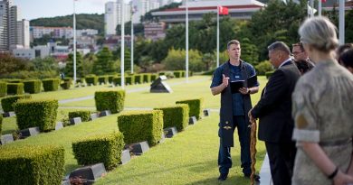 Chaplain Class 4 Russell Bone delivers a prayer in the United Nations Military Cemetary in Busan, Korea, to start the process of disinterring the bodies of two New Zealand service personnel who died and were buried in Korea. NZDF photo.