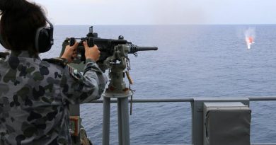 Able Seaman Stephanie Pannell engages a 'killer tomato' with a Browning M2 12.7mm machine gun on HMAS Warramunga during Exercise Bersama Lima 2016. Photo by Chief Petty Officer Martin Anderson.