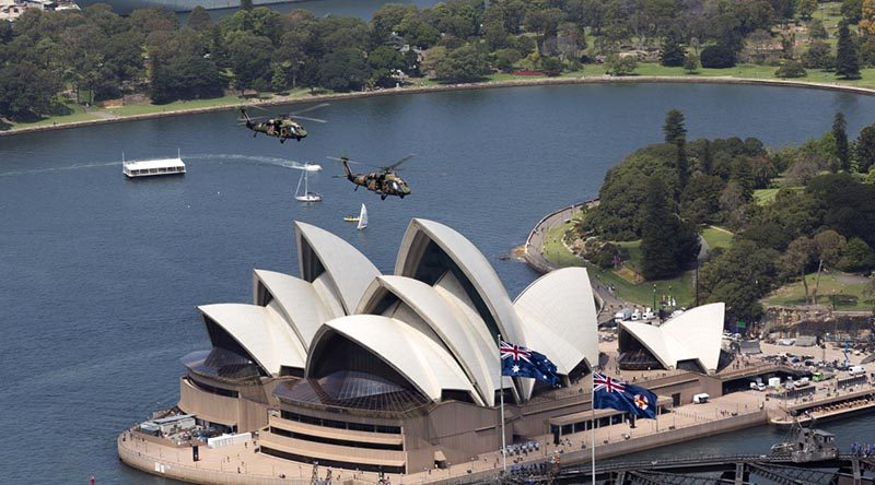 Two Black Hawk helicopters from 6th Aviation Regiment fly over Sydney Harbour to celebrate 50 years of the Australian Army Aviation Corps. Photo by Photo by Flight Sergeant Glen McCarthy.