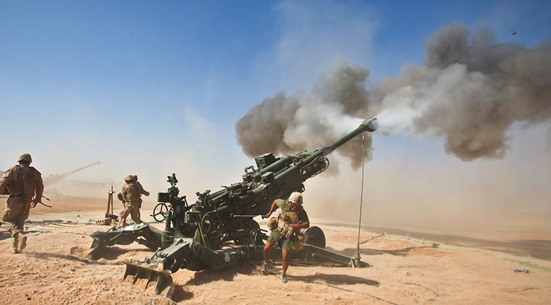 US Marines fire an M982 Excalibur® from an M777 155mm howitzer during a fire support mission at Fire Base Fiddlers Green, Helmand province, Afghanistan, October 2011. US DoD photo.