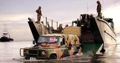 FILE PHOTO (November 2013): An Australian Army Land Rover lands on a beach in the Philippines during Operation Philippines Assist. Photo by Corporal Jake Sims (digitally altered by CONTACT).