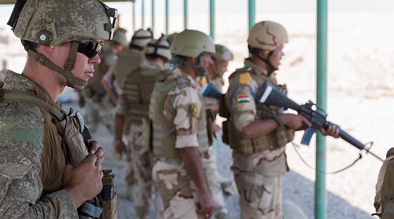 A New Zealand Army soldier observes as Baghdad Fighting School instructors train members of the Iraqi Army's 41st Brigade during a live-fire range practice at Taji Military Complex, Iraq. ADF photo.