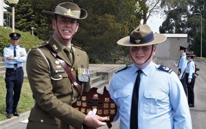 Cadet Flight Sergeant Blake Harding receives his award as the 602 Squadron Senior Cadet of the Year from Lieutenant-Colonel Corey Shillabeer, Commanding Officer of 16 Air Land Regiment, Royal Regiment of Australian Artillery. Photo by Flying Officer (AAFC) Paul Rosenzweig.