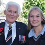 Don Cameron at Modbury High School with his grand-daughter Megan, in the school’s Anzac Garden which was established in 2015 to commemorate the Centenary of Anzac. Photo by Flying Officer (AAFC) Paul Rosenzweig.