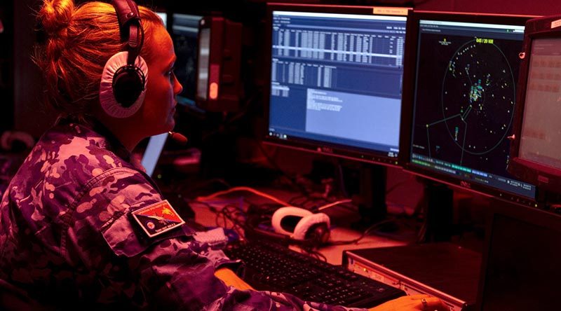 Leading Aircraftwoman Alex McClenaghan, a RAAF air surveillance operations operator, monitors the airspace over Port Moresby in support of APEC 2018. Photo by Able Seaman Kieren Whiteley.