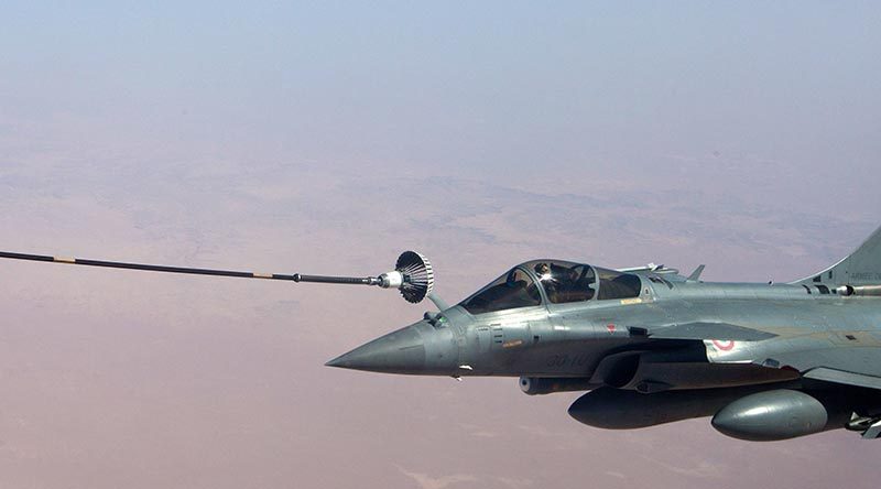 A Royal Australian Air Force KC-30A Multi Role Tanker Transport aircraft refuels a French Air Force Dassault Rafale fighter on operations in the Middle East. Photo by Sergeant Mark Doran.
