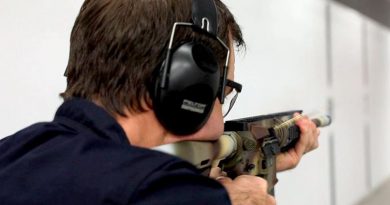 A NIOA employee goes full auto with a Colt M4A1-AU on the range to test the durability of EC Paint under extreme conditions. NIOA photo.