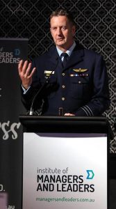 Wing Commander (AAFC) Paul Hughes addresses the audience at the Sir John Storey Leadership Awards in Sydney. Photo supplied.