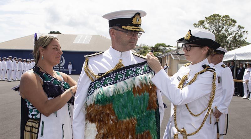 New Chief of Navy Rear Admiral David Proctor, has the Chief of Navy’s symbol, the korowai, placed on him at a change of command ceremony, 29 November 2018. NZDF photo.
