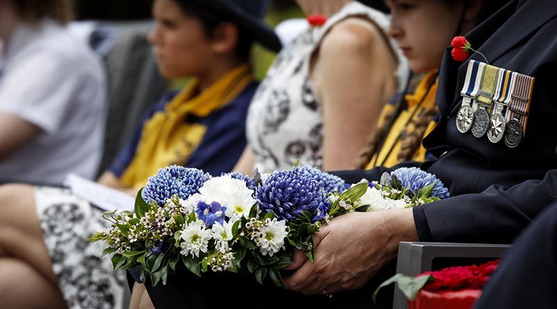 Official guests of the Remembrance Day Service held at Victoria Barracks Brisbane watch on during proceedings before laying wreaths at the cenotaph. Photo by Corporal Jessica de Rouw.