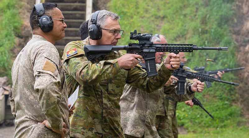 Australia's Chief of Army Lieutenant General Rick Burr showing good form on the range in New Zealand – his New Zealand counterpart Major General John Boswell partly obscured in the background. NZDF photo.