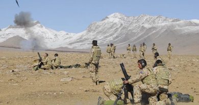 Australian soldiers from Mortar Platoon 2RAR fire a salvo during operations in the Chora Valley, Afghanistan. Photo by Corporal Hamish Paterson.