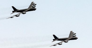 A pair of United States Air Force B-52 bombers fly over Canberra during a ceremony to mark the 50th anniversary of the Battle of Long Tan. Photo by Petty Officer Phil Cullinan.