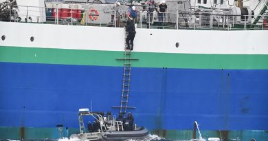 A fishery officer from New Zealand's Ministry for Primary Industries boards a commercial fishing vessel during joint patrols with the New Zealand Defence Force. NZDF photo.