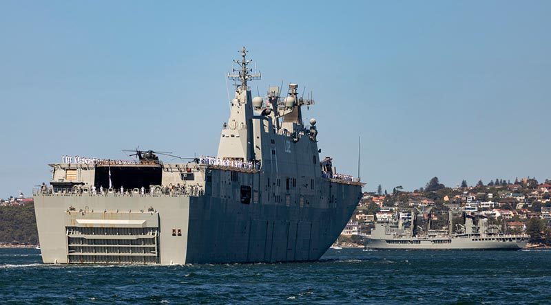 HMA Ships Canberra and Success depart Sydney Harbour (in company with HMAS Newcastle) for a four month deployment conducting training exercise and international engagement activities. Photo by Able Seaman Leo Baumgartner.