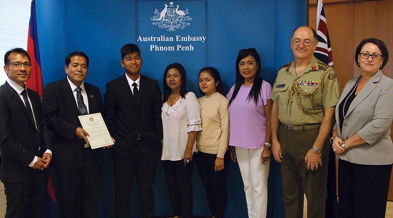 Cambodian interpreter Toch Rada with family and colleagues at the Australian Embassy in Phnom Penh.
