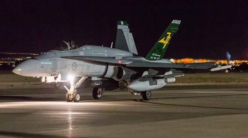 A RAAF Number 77 Squadron F/A-18A Hornet taxies for an Exercise Red Flag 19-1 night mission at Nellis Air Force Base, Nevada. Photo by Corporal David Cotton.