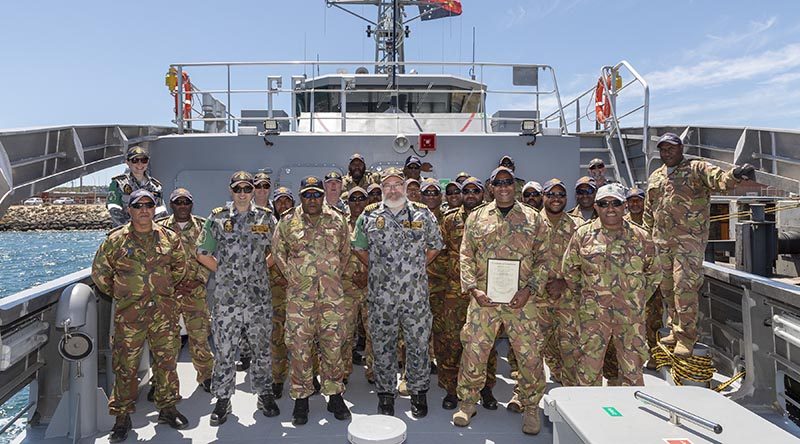 Members of the Royal Australian Navy Sea Training Group with the Papua New Guinea Defence Force Maritime Element ships company of 'Ted Diro' (P401) on completion of the ships sea readiness evaluation at HMAS Stirling in Western Australia. Photo by Able Seaman Christopher Szumlanski.