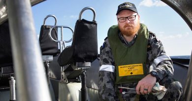 Leading Seaman Daniel Jackson maintains the ship's sea boats as part of his regular duties on board HMAS Ballarat, but has secondary duties that see him employed as a drug-buster. Photo by Leading Seaman Bradley Darvill.