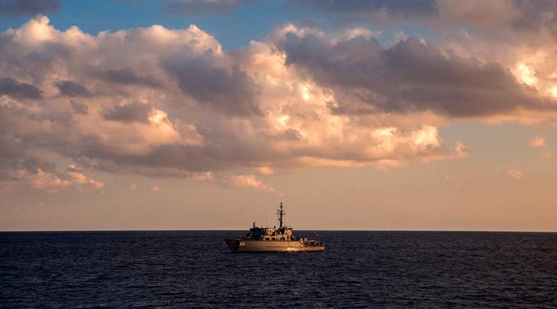 Minehunter coastal HMAS Diamantina sails across the Bay of Bengal towards Sri Lanka before commencing a search for the lost Australian warship HMAS Vampire. Photo by Leading Seaman Kayla Jackson.