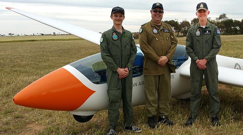 Cadet Corporal Benjamin Dunk (right) after achieving solo status in the DG-1000S glider on 6 October 2017 during a gliding camp at Balaklava, SA; with Cadet Corporal Tomasz Kocimski (left) and their instructor Pilot Officer (AAFC) Dennis Medlow. Photo supplied by No 600 Aviation Training Squadron