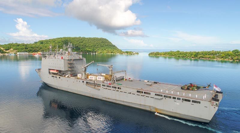 HMAS Choules sails into Port Villa, Vanuatu, during her 2019 month-long Pacific Engagement deployment. Photo by WO2 Mick Davis.