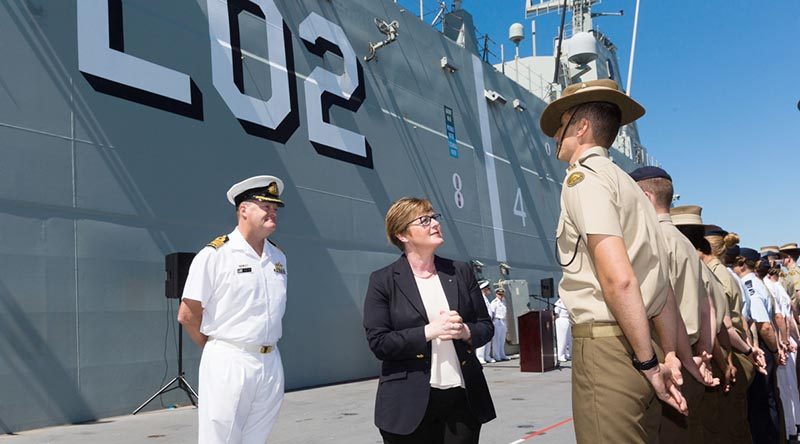 Minister for Defence Industry Linda Reynolds and Commanding Officer HMAS Canberra Captain Ashley Papp inspect members of Joint Task Force 661 before their departure for Indo-Pacific Endeavour 2019. Photo by Leading Seaman Steven Thomson.