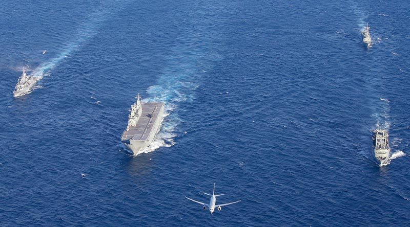 HMAS Ships Parramatta, Canberra, Newcastle and Success in formation with a P-8A Poseidon and a MH60-R helicopter off the Western Australia coast on its way to Sri Lanka and beyond. Photo by Corporal Kylie Gibson.