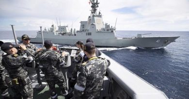 HMAS Melbourne's crew trial the prototype Maritime Multi-cam Pattern Uniform at sea, in company with HMAS Brisbane. Photo by Leading Seaman Kieran Dempsey