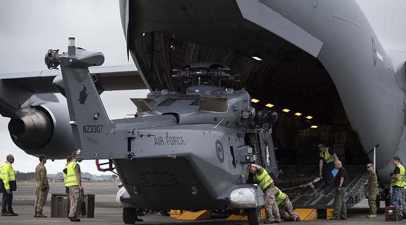 A RNZAF no.3 SQN NH90 helicopter is loaded into a RAAF C-17 Globemaster III, on its way to the Solomon Islands for the first post RAMSI general election on the archipelago. NZDF photo.