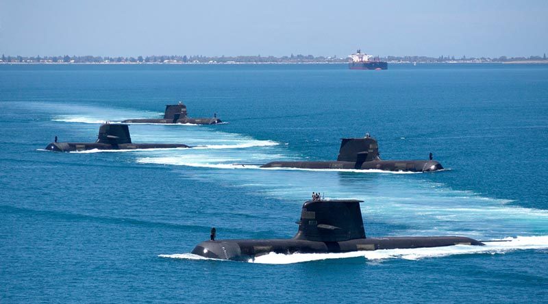 Collins-class submarines HMAS Collins, HMAS Farncomb, HMAS Dechaineux and HMAS Sheean transition through Cockburn Sound, Western Australia. Photo by Lieutenant Chris Prescott.