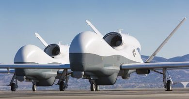 Two Northrop Grumman MQ-4C Tritons at a Northrop Grumman test facility in Palmdale, California. US Navy photo courtesy of Northrop Grumman by Chad Slattery.