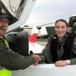 CCPL Kiera Galan (429 Squadron) is congratulated by SQNLDR Gary Presneill after completing her first solo flight on 18 April. Image by SQNLDR (AAFC) Scott Wiggins.