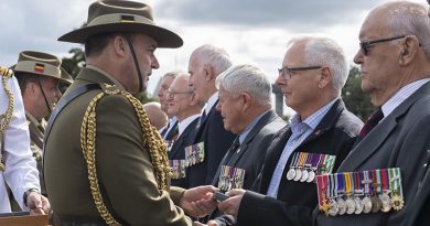 Veterans from 161 Battery 16th Field Regiment, Royal New Zealand Artillery, receive an Australian Unit Citation for Gallantry at Linton Military Camp from Major General Gregory Bilton, Forces Commander Australian Army. NZDF photo.