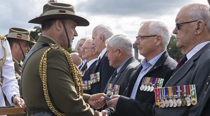 Veterans from 161 Battery 16th Field Regiment, Royal New Zealand Artillery, receive an Australian Unit Citation for Gallantry at Linton Military Camp from Major General Gregory Bilton, Forces Commander Australian Army. NZDF photo.