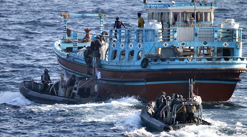 HMAS Ballarat's boarding party conduct a boarding of a suspicious dhow. Photo by Leading Seaman Bradley Darvill.